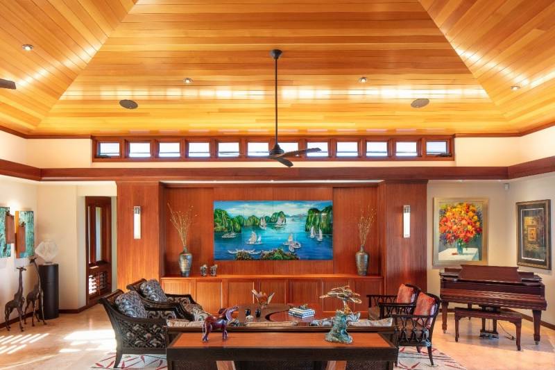 dining room with wood accents in custom hokulia home