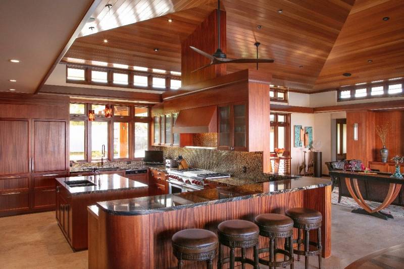 high vaulted wood ceiling and wood walls in kitchen