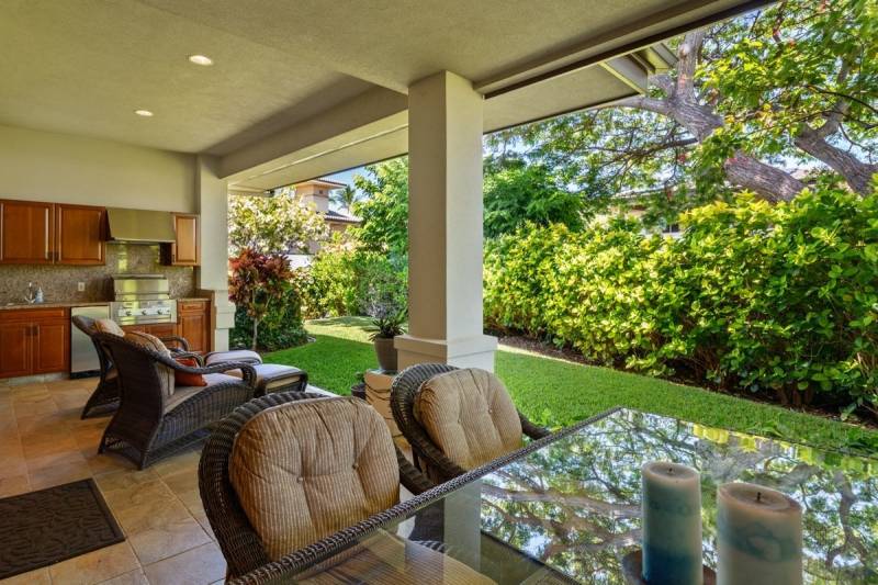 outdoor seating and grill on lanai