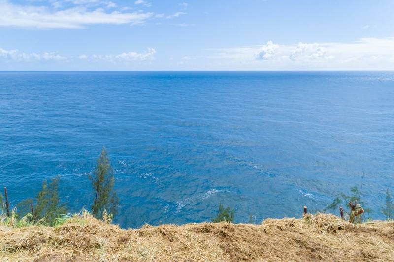 view of the ocean from a cliffside