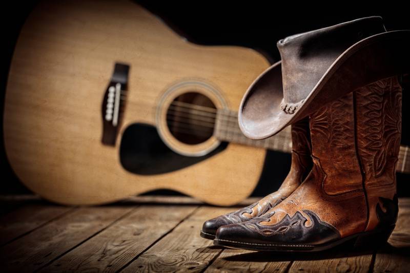 cowboy boots and guitar