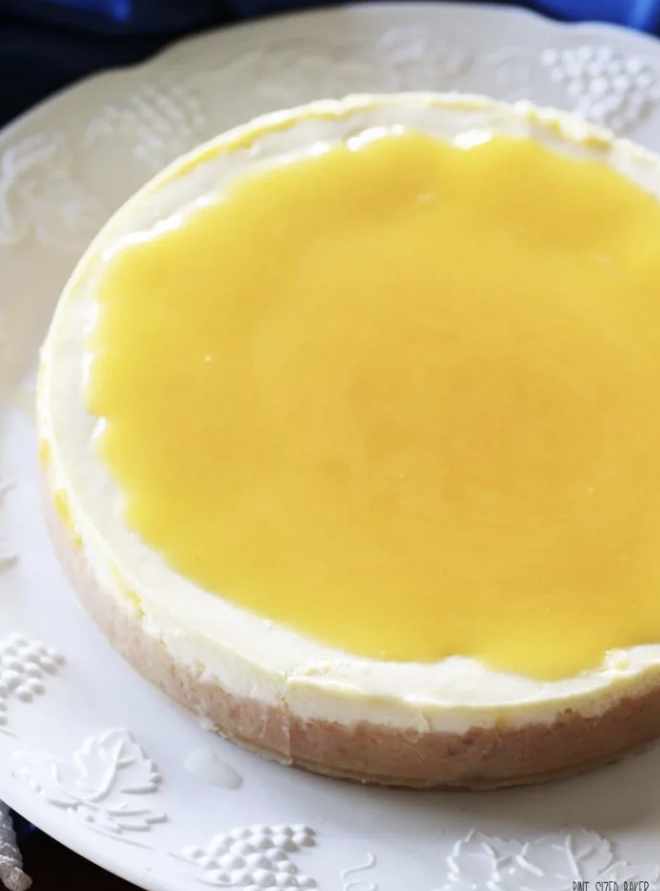cheesecake topped with golden lilikoi curd