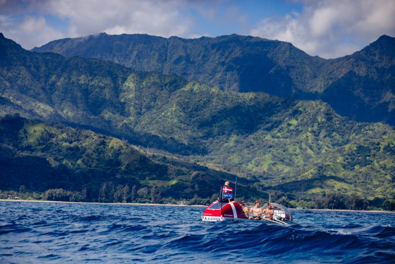 rowers on a boat on kauai ocean
