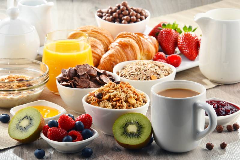Breakfast,Served,With,Coffee,,Orange,Juice,,Croissants,,Cereals,And,Fruits.