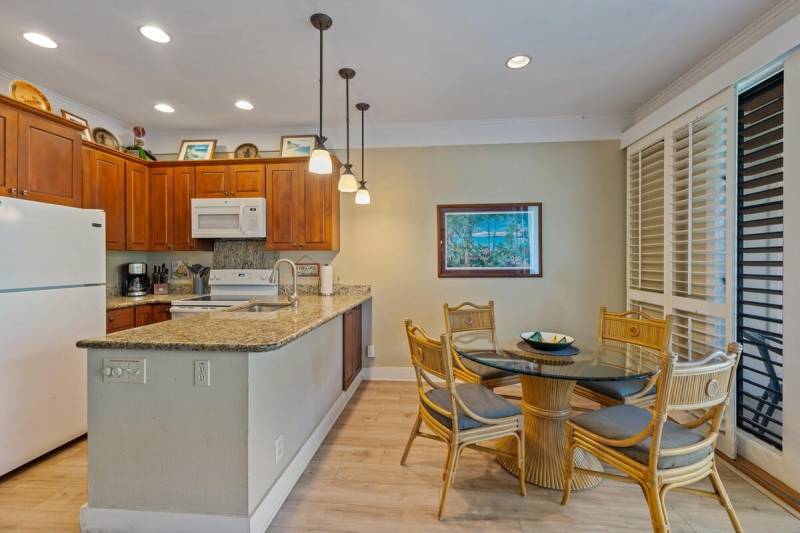 kitchen and dining space in kiahuna plantation condo for sale