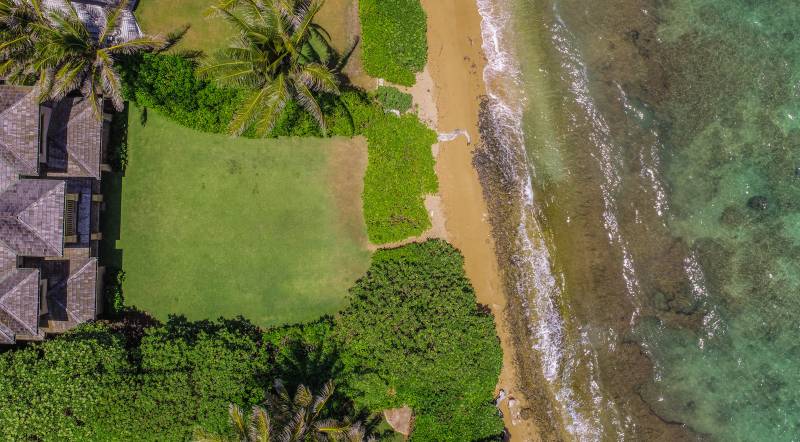 direct aerial view of beachfront kauai property for sale