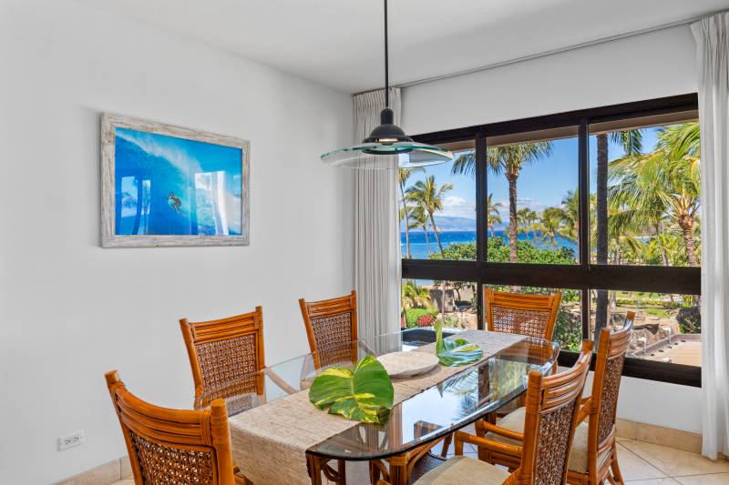 large windows in dining room let in maui ocean views