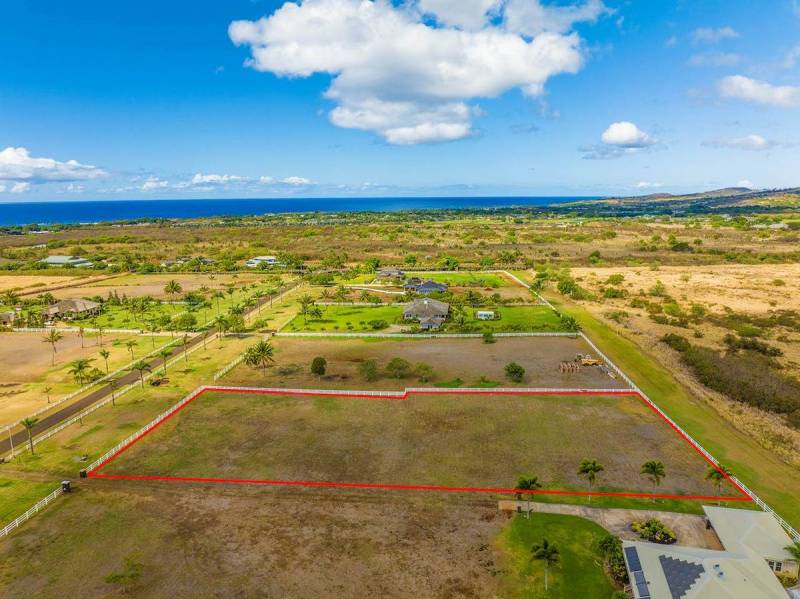 aerial view of poipu aina estate lot with lot lines in red