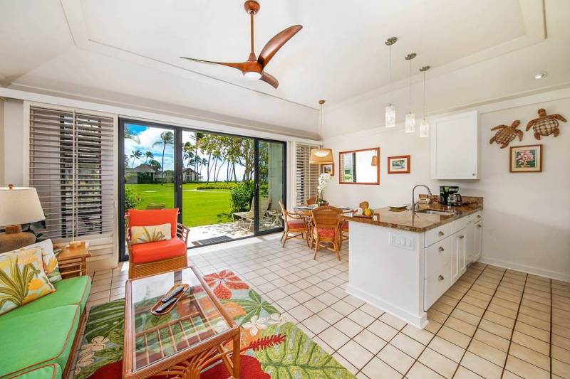 living, dining, and kitchen area in kiahuna condo on kauai