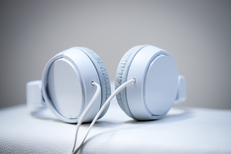 white over the ear headphones on white background