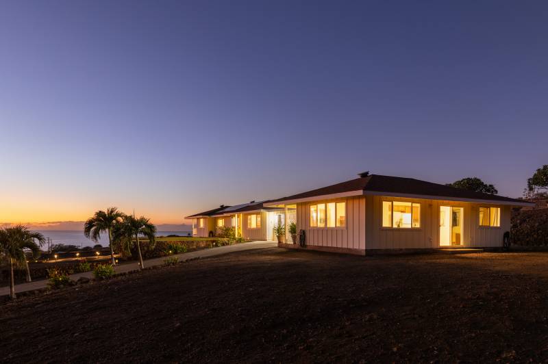 exterior of ocean view home at dusk
