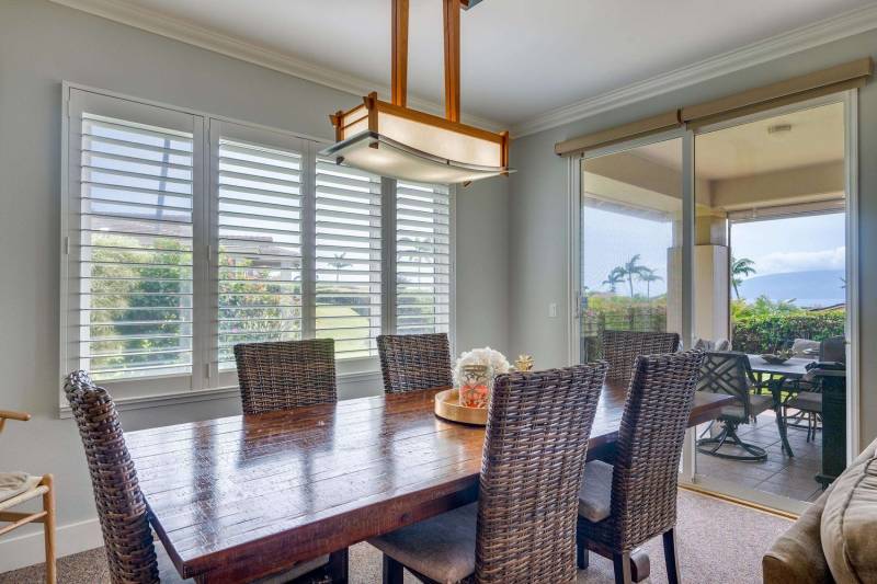 dining room with sliding glass door to covered lanai