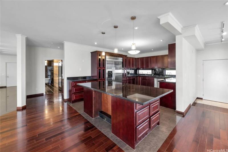 kitchen with cherry wood cabinets and stainless steel appliances