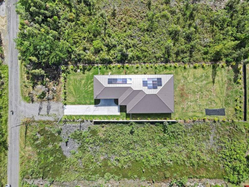 overhead view of home with solar panels in hawaiian paradise park big island