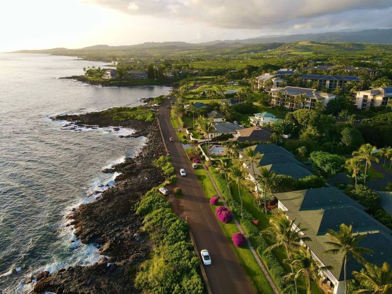 aerial view of beachfront neighborhood in poipu kauai