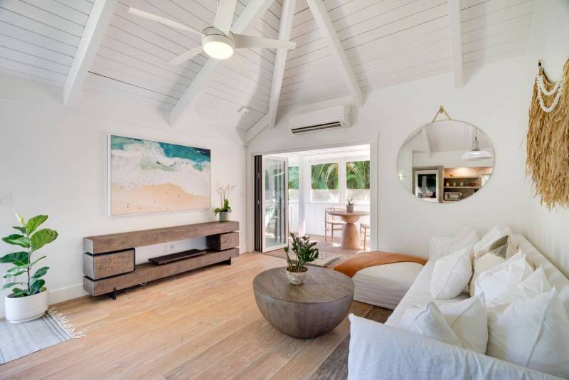 living room with teak wood floors