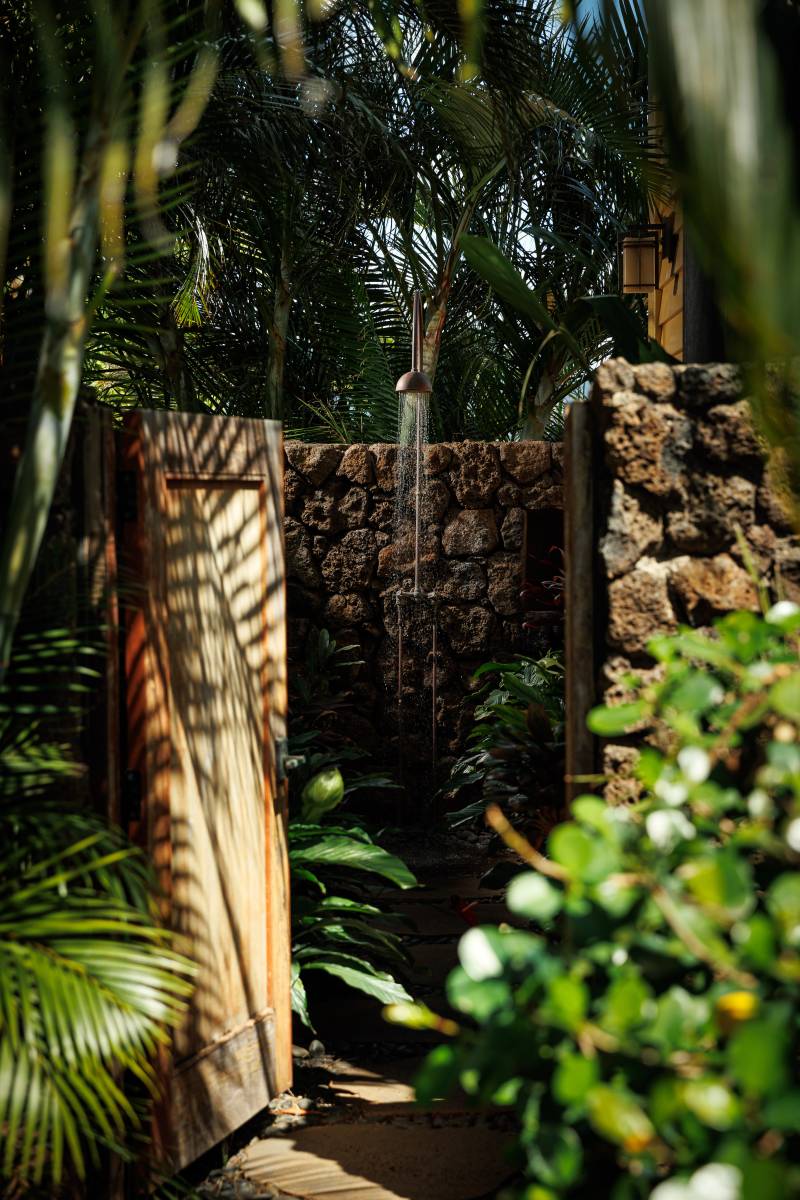 outdoor shower in a tropical setting