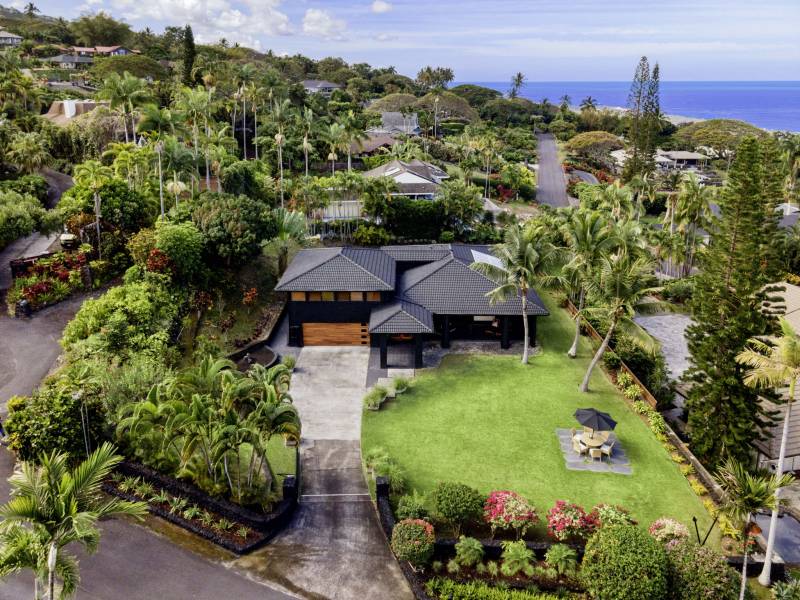 aerial drone view of home on big island hawaii near the ocean