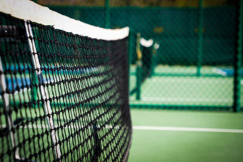 up close view of net on pickleball court at hokulia community hawaii