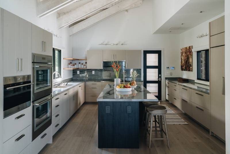 modern kitchen with white cabinets