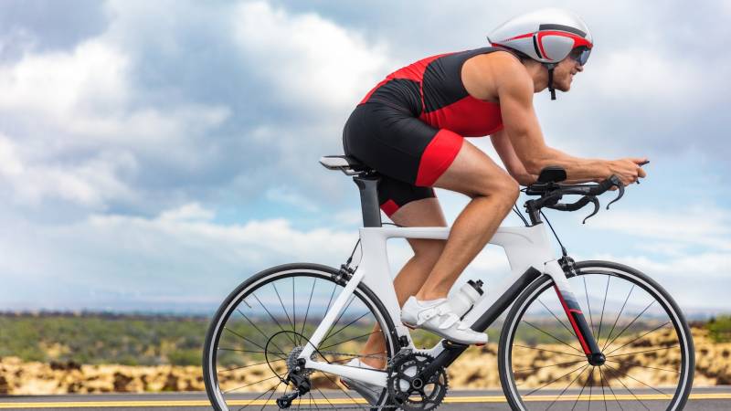 ironman athlete on bicycle