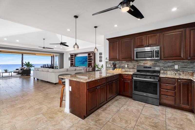 spacious kitchen with ocean views through the living room