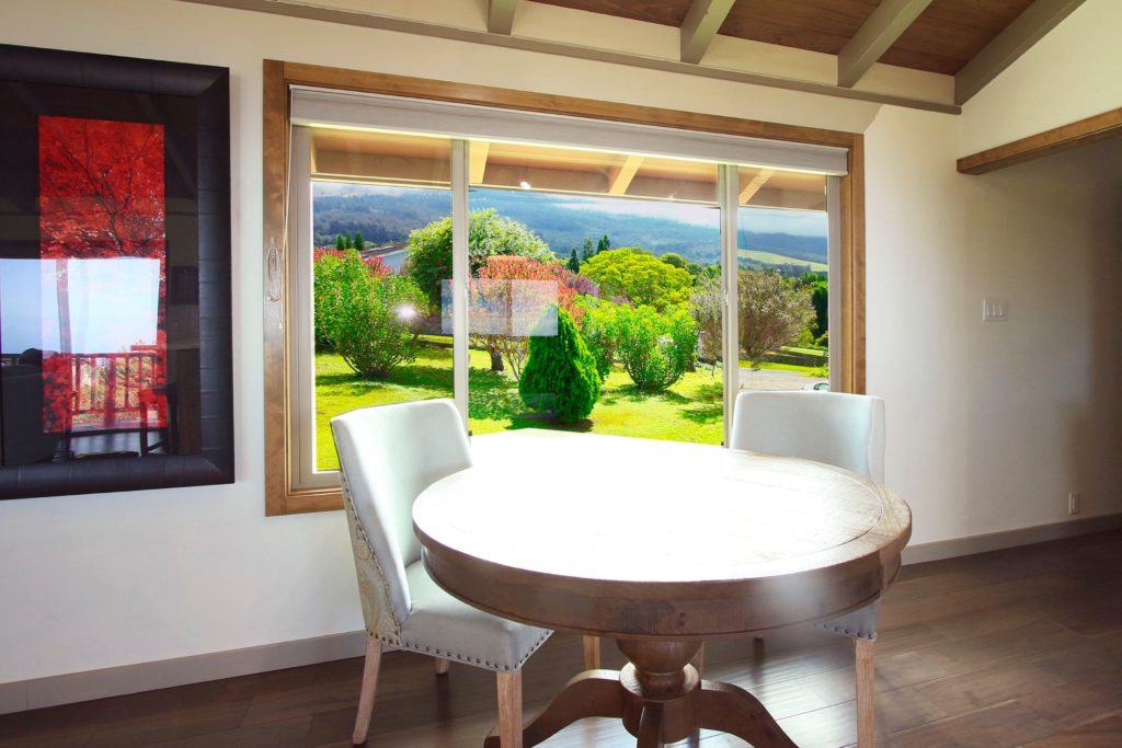 dining space with green maui views through the window