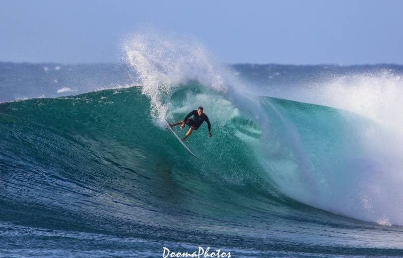 Micah Nickens surfing Maui