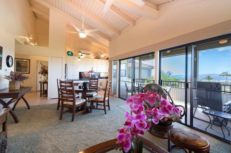 living area with doors to lanai