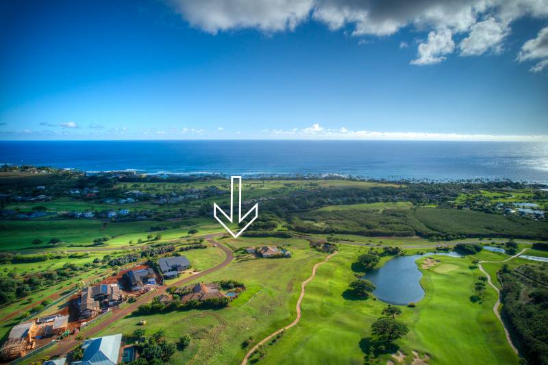 aerial view of kukuiula community on kauai with arrow pointing to homesite for sale