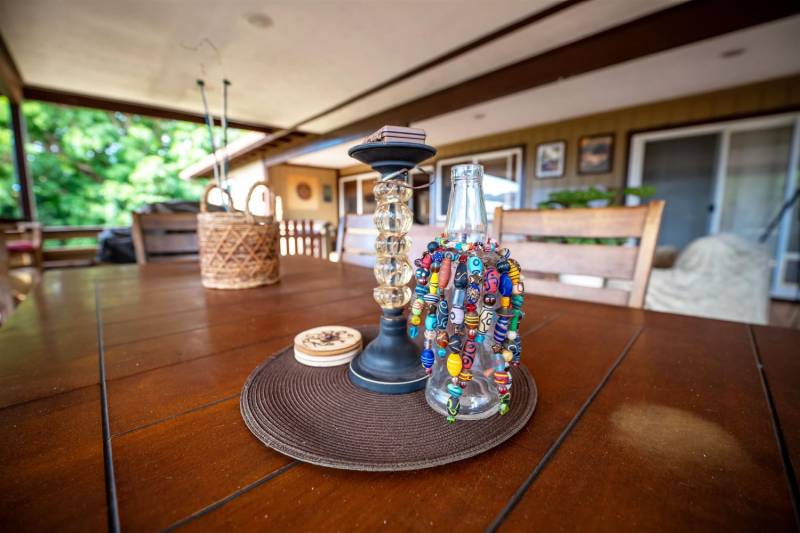 beaded vase on table