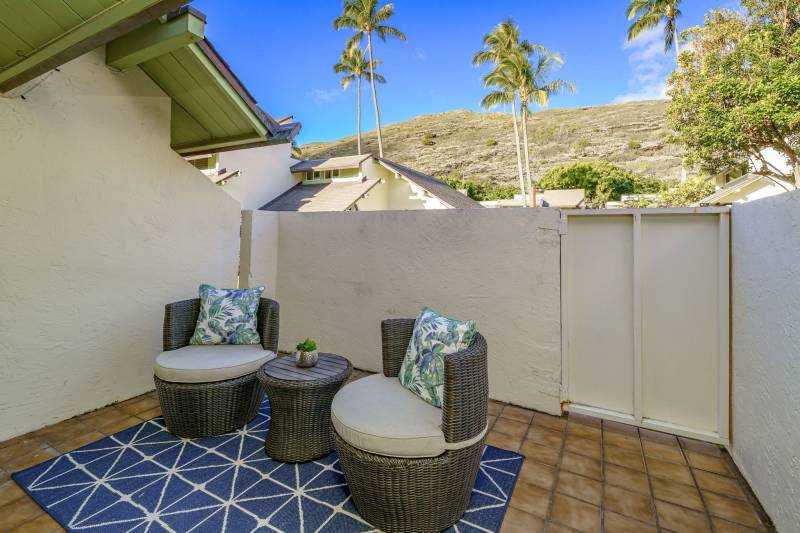 private outdoor seating area at village green townhouse on oahu