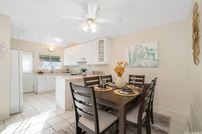 white and cream colored kitchen in village green townhome for sale on oahu