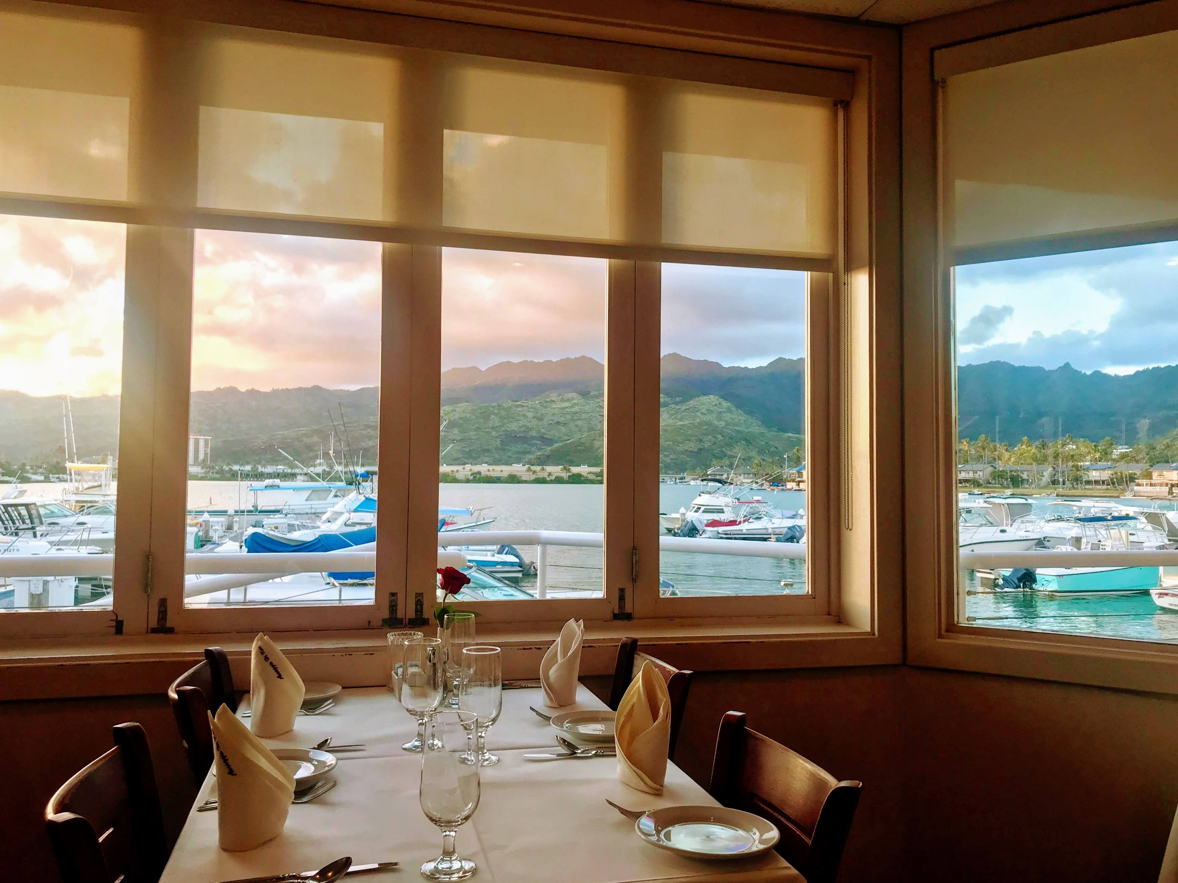 table at restaurant with view of hawaii kai marina