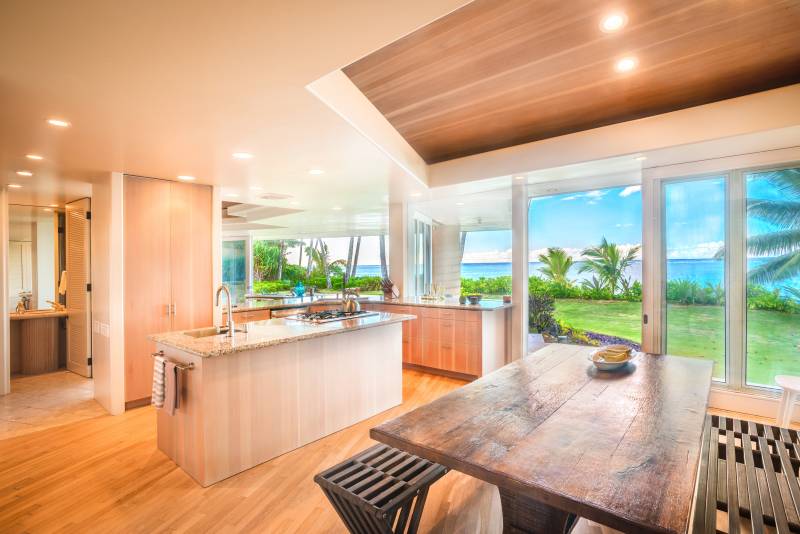 kitchen with large windows in anini beach kauai house for sale on the north shore