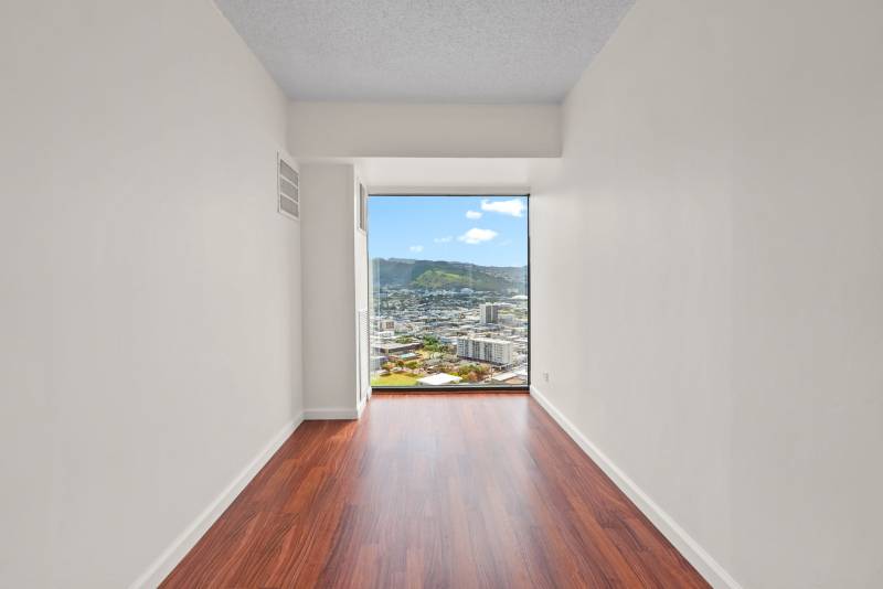 view of honolulu through condo window