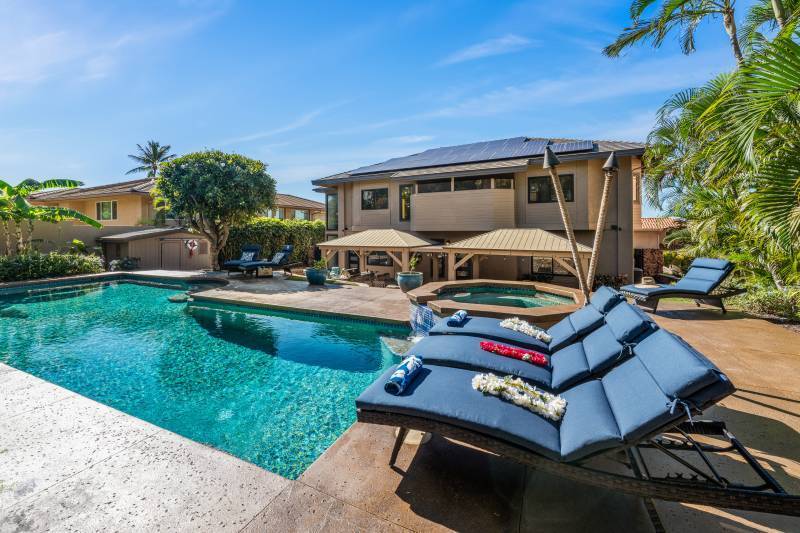 outdoor lounge chairs by the pool