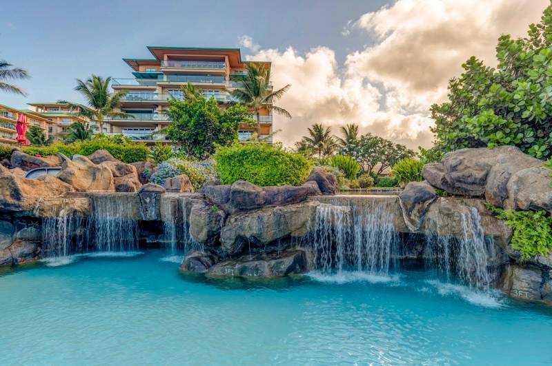 luxurious pool with waterfall at honua kai maui