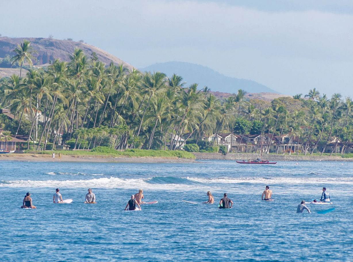 surfers waiting for a wave in lahaina maui