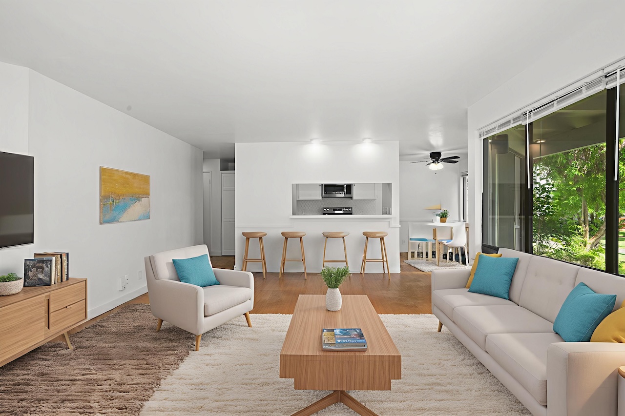 living room and kitchen in lihue condo for sale