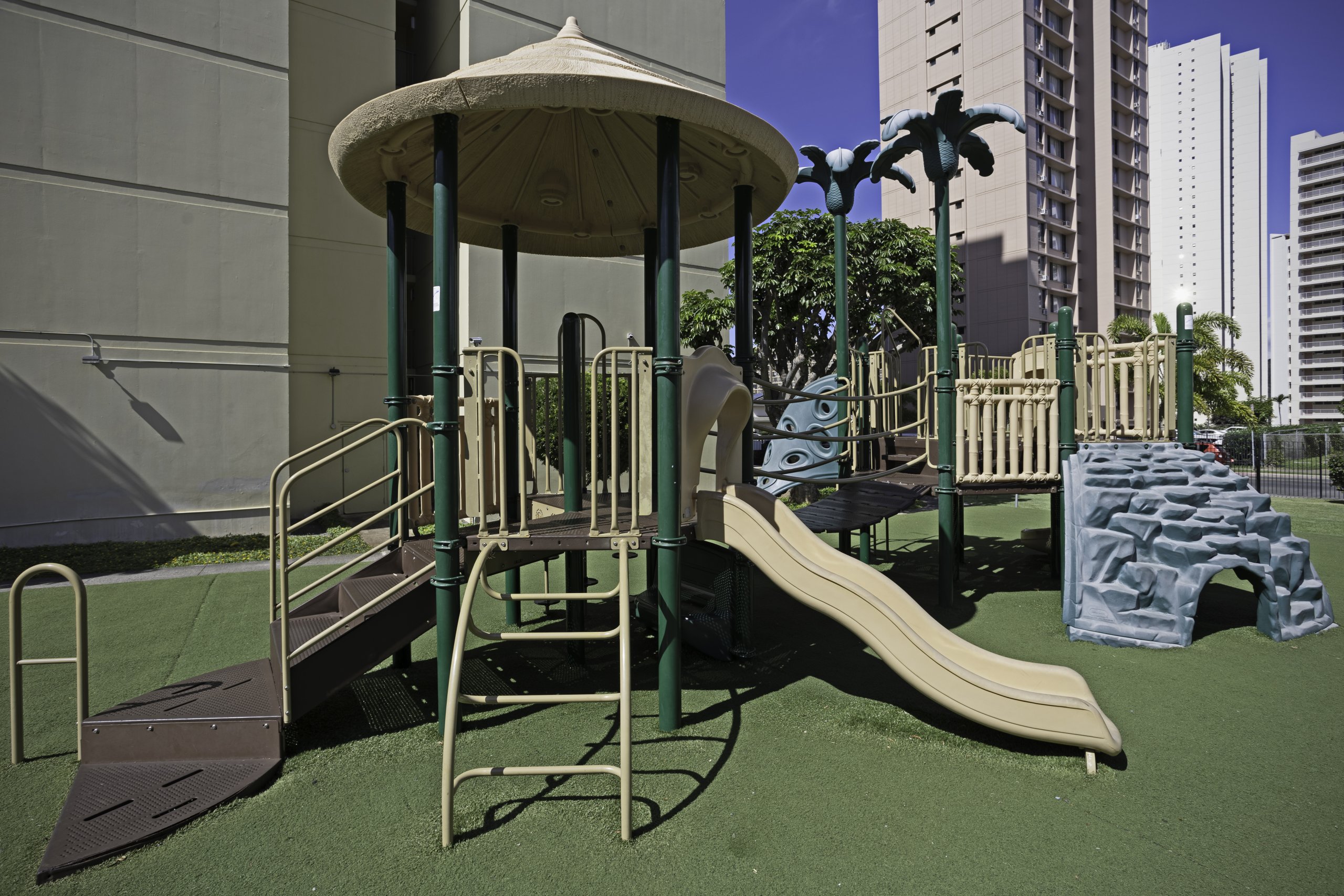 Playground and open recreational space within Century West condominium grounds