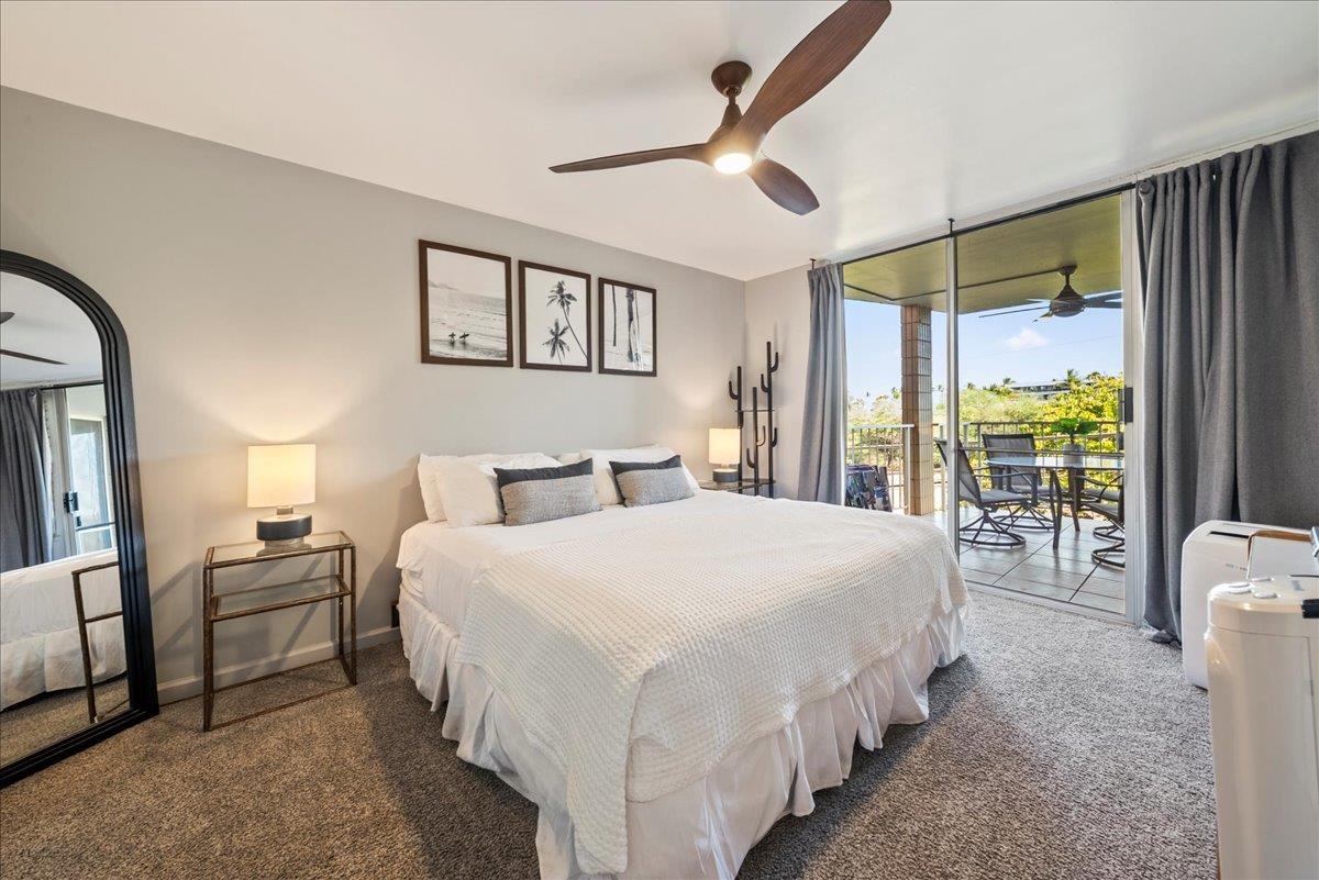Cozy bedroom with sliding doors to lanai