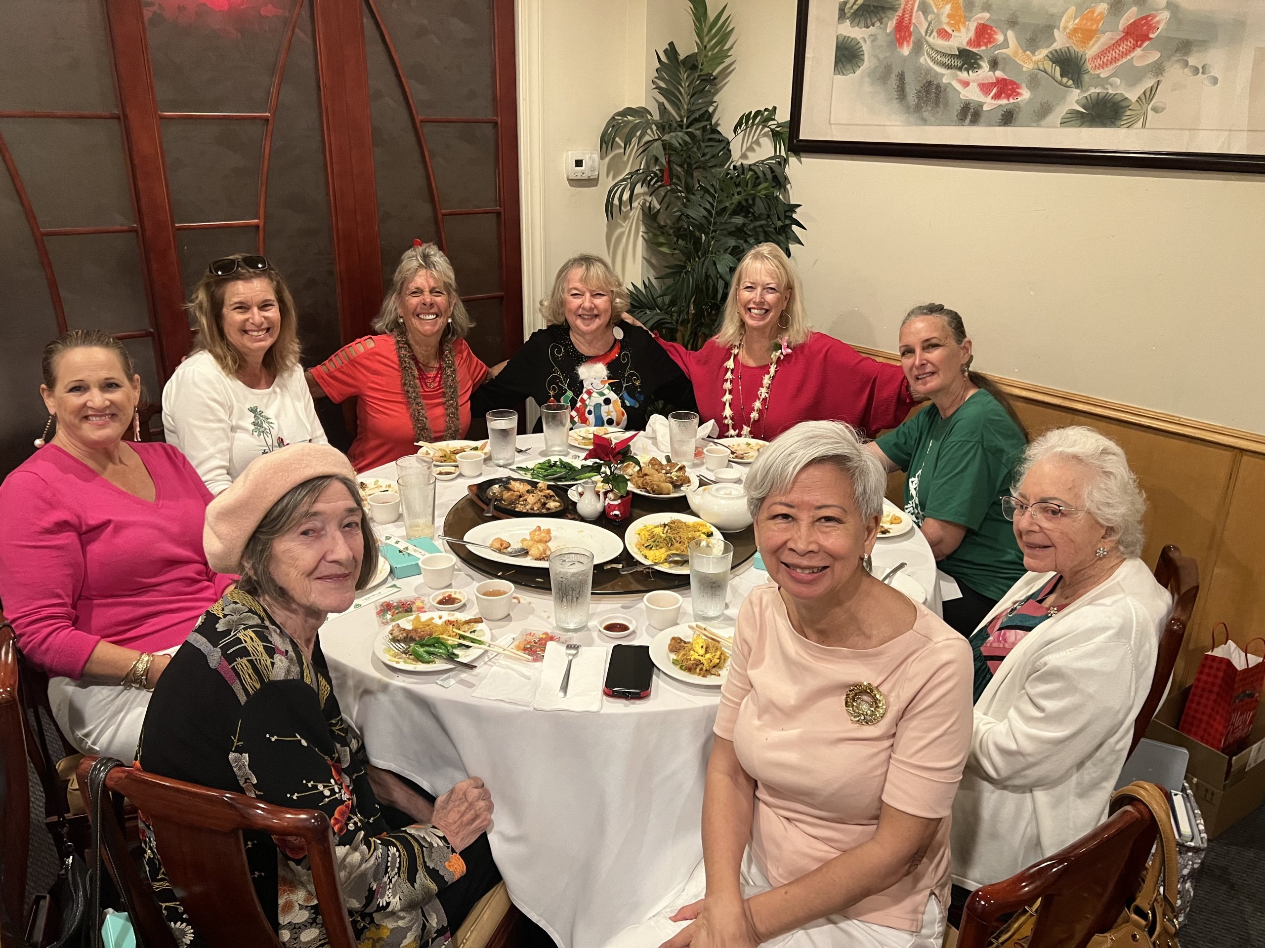 women around table at chinese restaurant