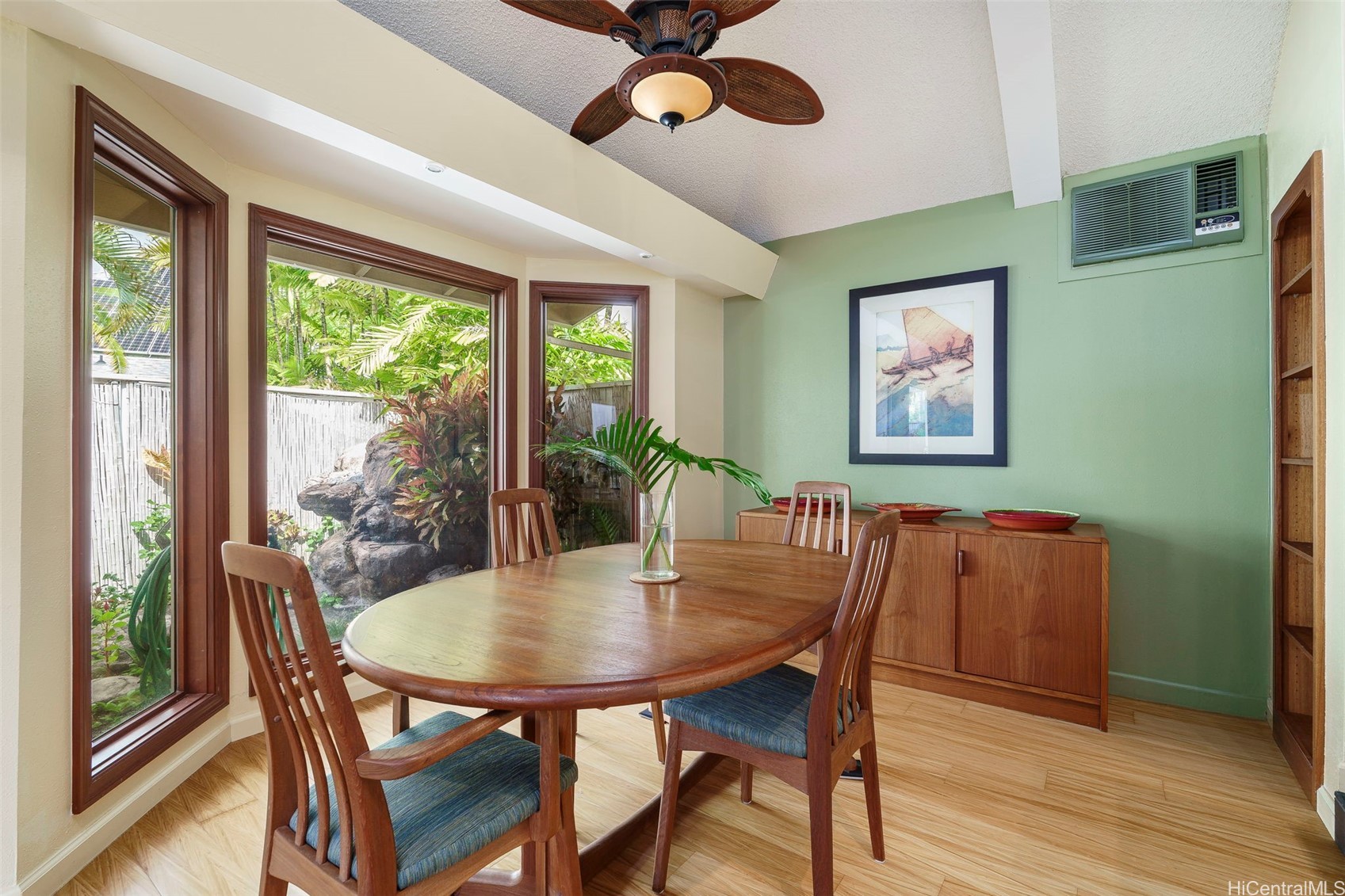 Dining nook overlooking tropical landscaping