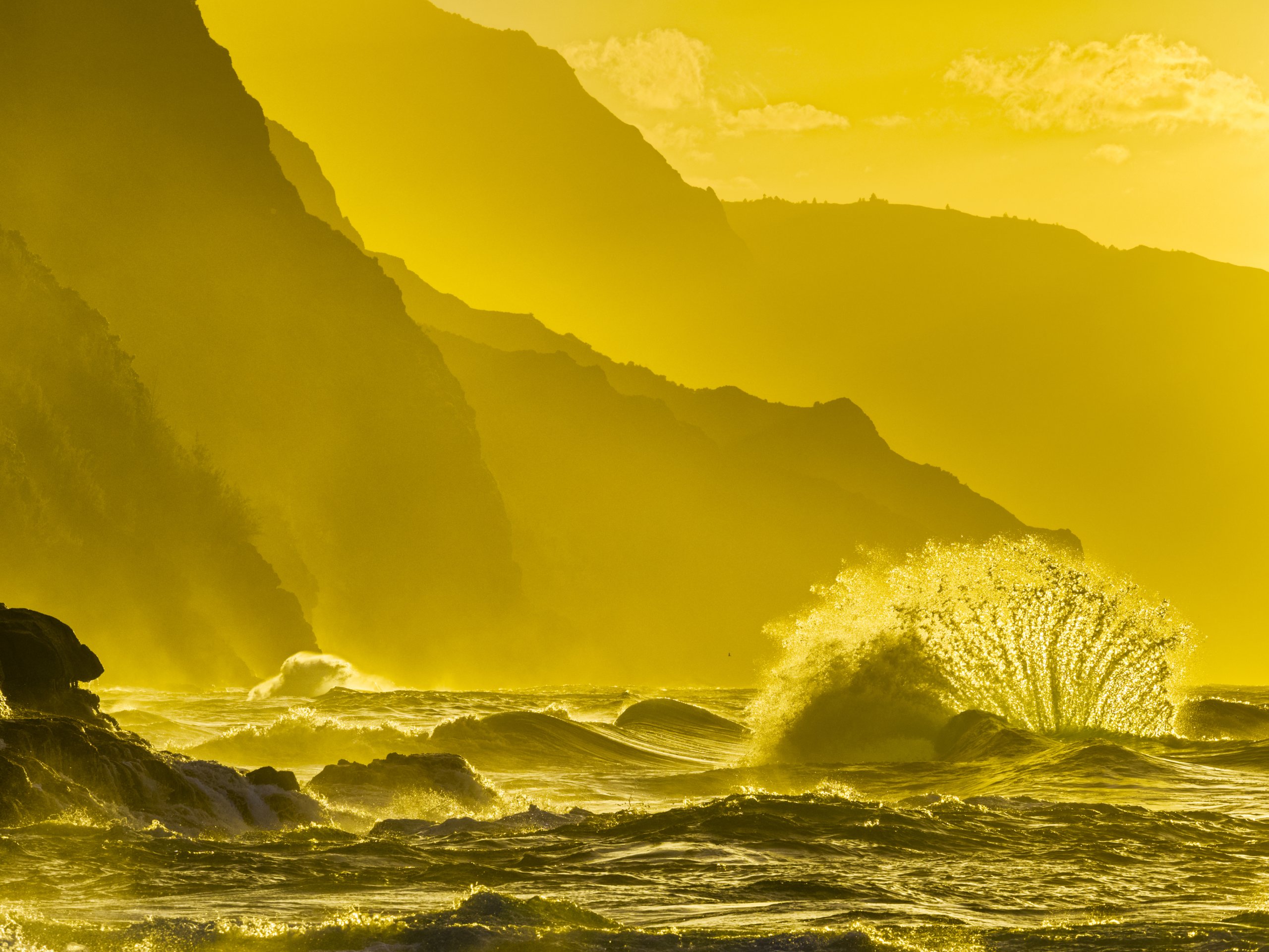 glowy golden waves on kauai beach