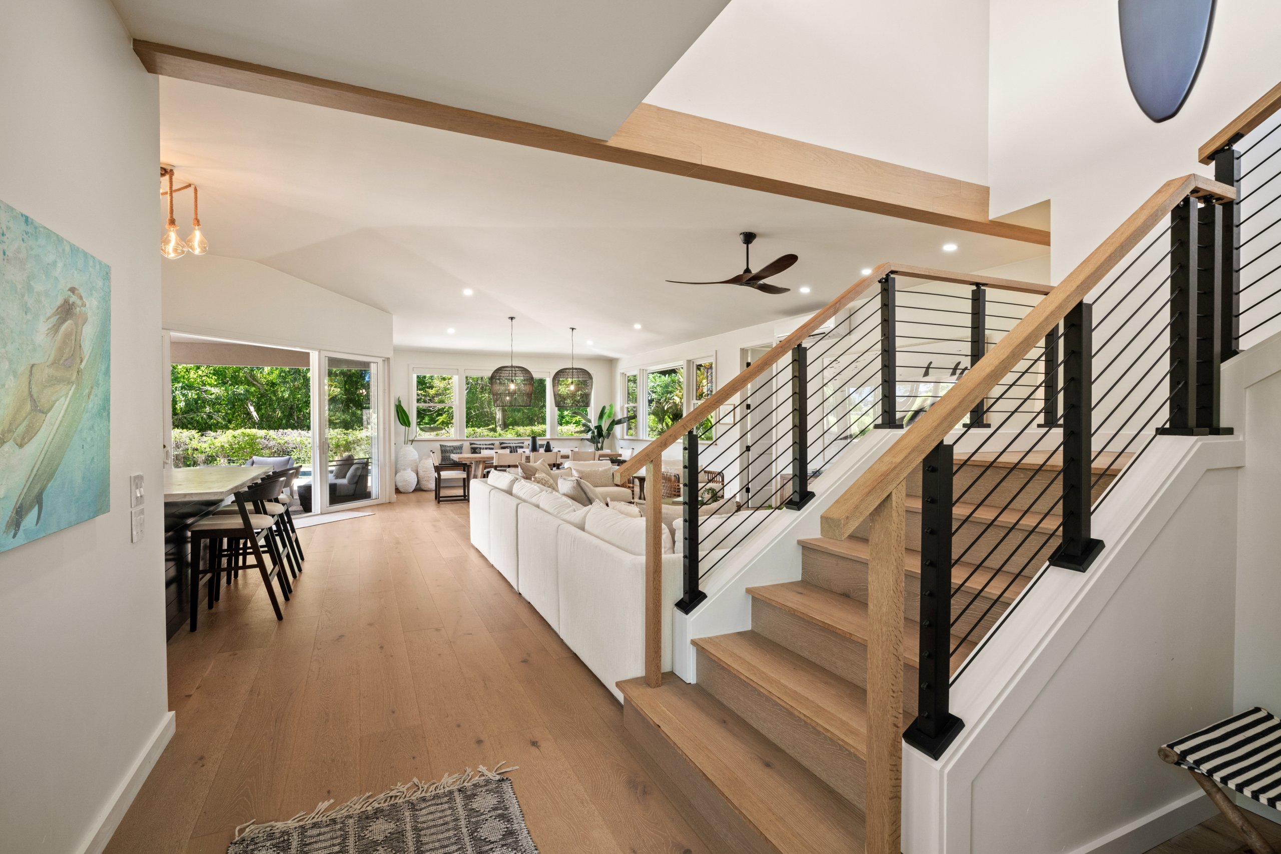 Open-concept living room with clean lines and neutral furnishings