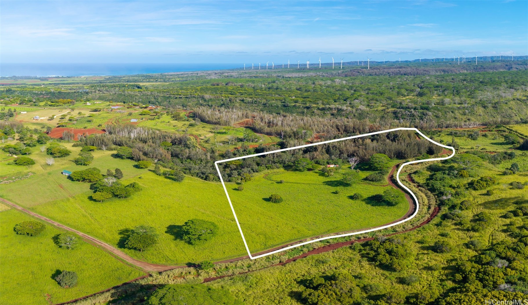 Aerial view with lot lines of land for sale on the North Shore of Oahu