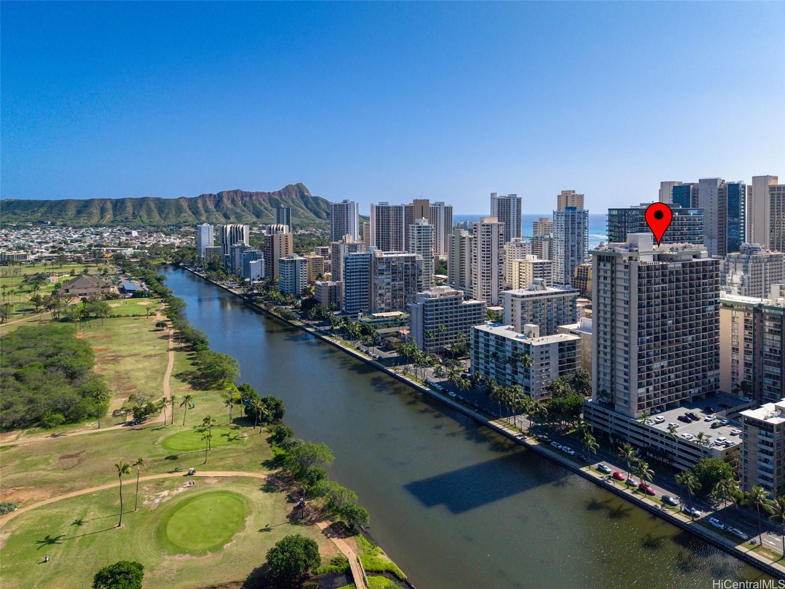 Aerial view of Fairway Villa condo located along Ala Wai Canal in Hawaii Kai