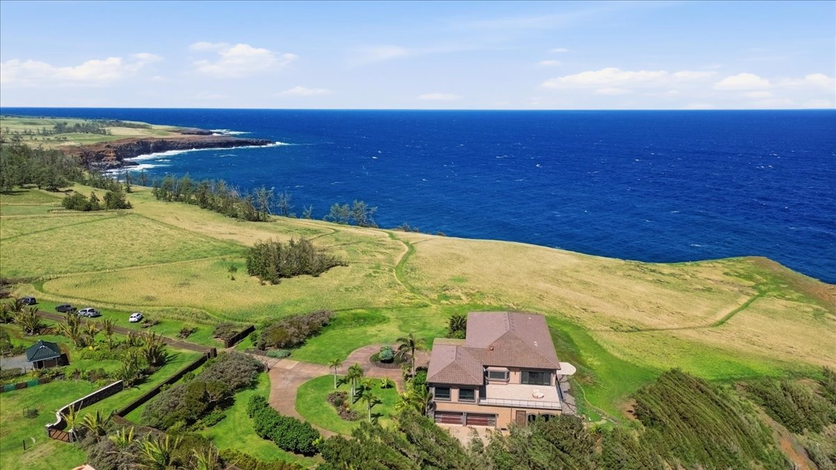 Aerial view of a 20-acre North Hawaiʻi oceanfront estate with half-mile of coastline.