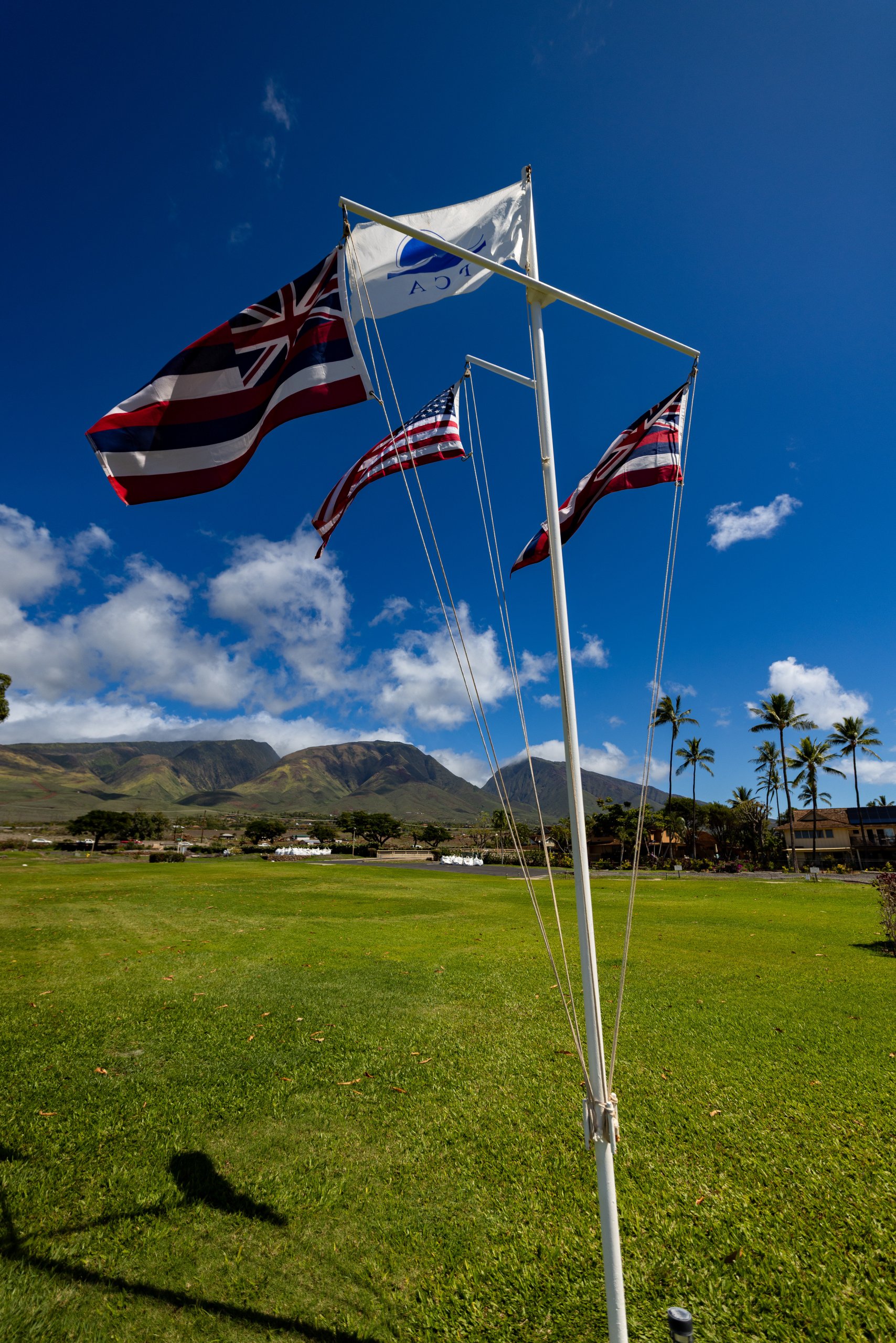 Flags flying in West Maui at Puanama condos